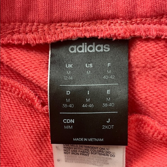 adidas Women's Athletic Shorts in Coral with White Logo - Picture 2 of 8